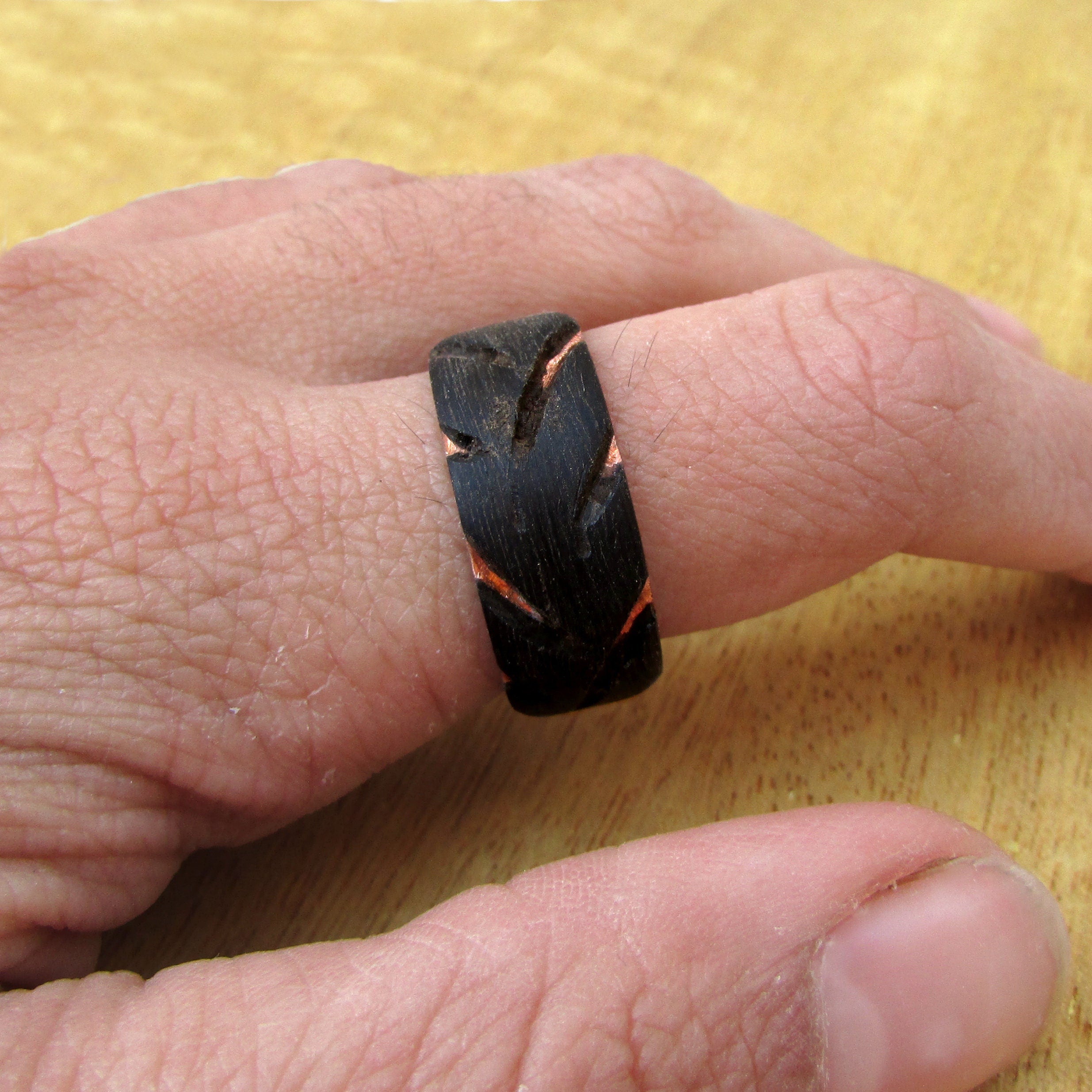 Wooden tire tread ring, Mens black wedding band, copper and wood wedding ring, 5 year anniversary gift for car enthusiast, natural jewelry